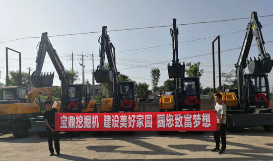 寶鼎輪式挖掘機致富新農村建設.jpg 寶鼎輪式挖掘機致富新農村建設.jpg